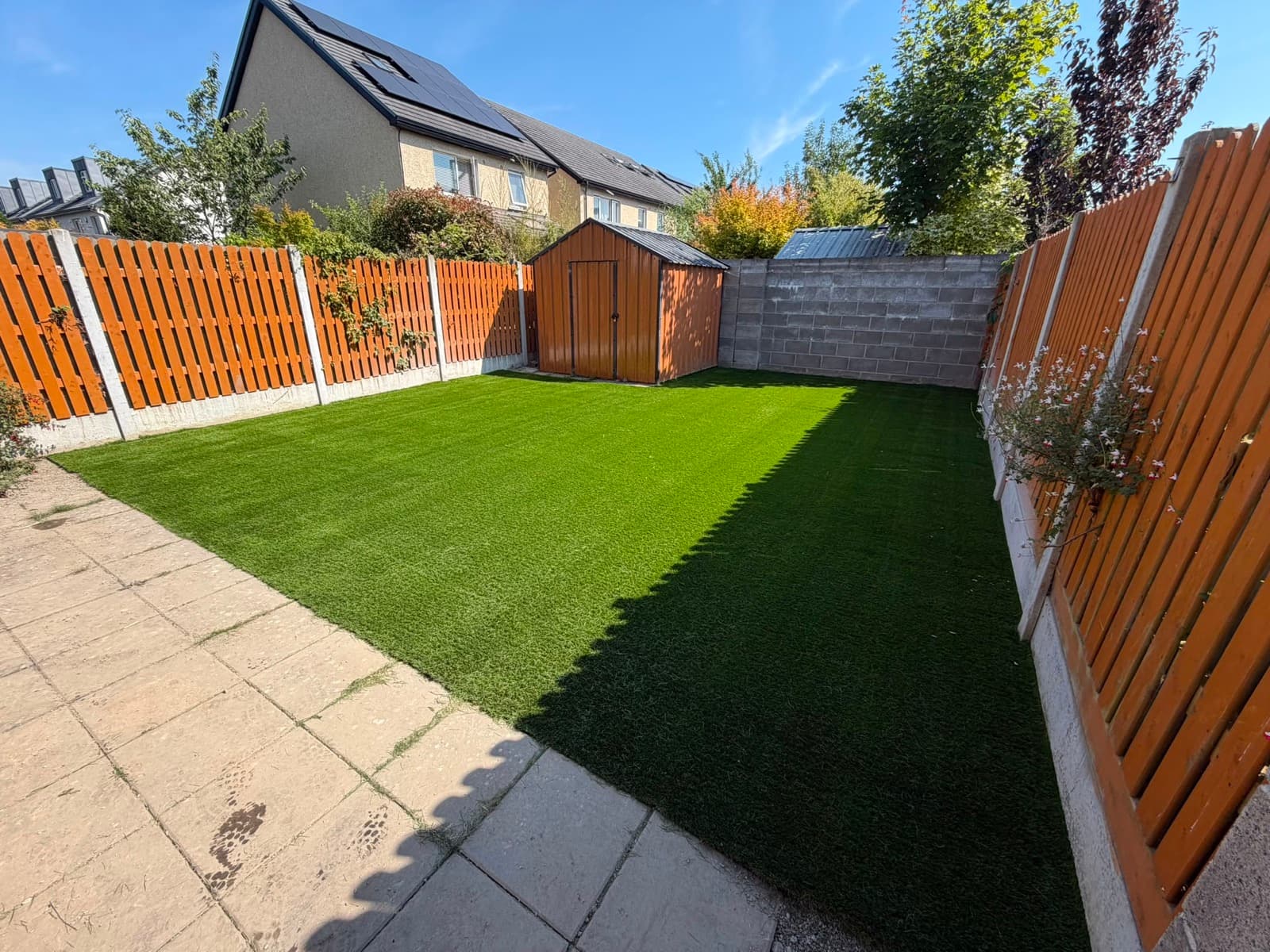 Artificial grass lawn with shed — Dublin back garden