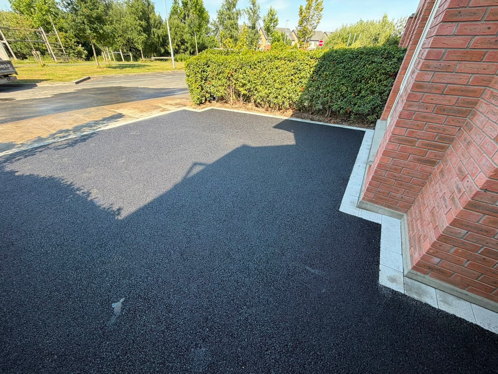 Tarmac driveway with silver granite edging